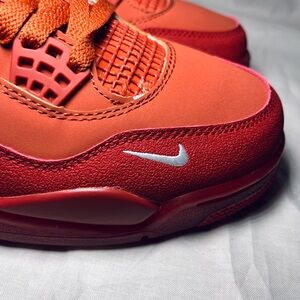 Nike Red and Orange Low-Top Sneaker with White Swoosh